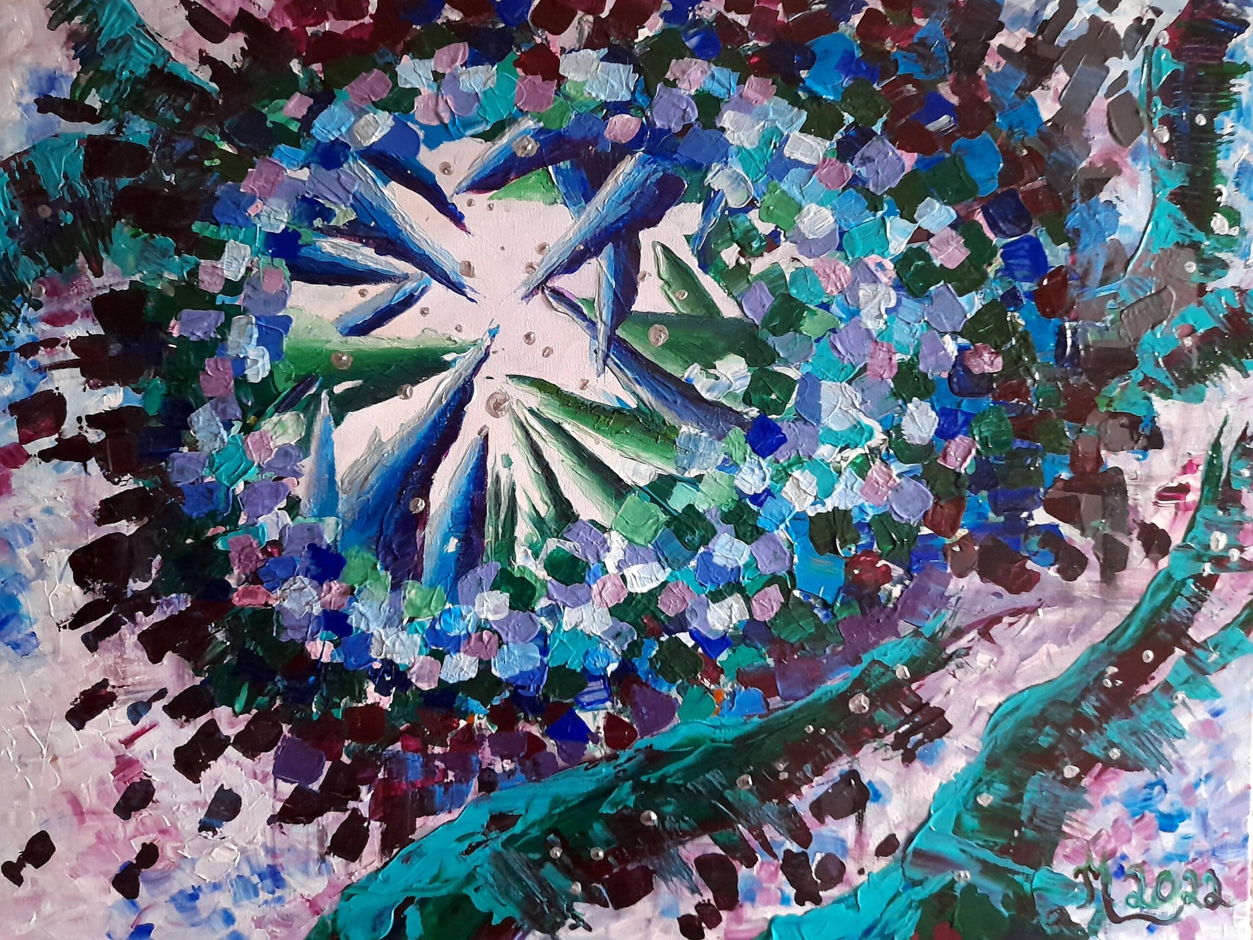 "An abstract painting composed of bold, textured brushstrokes forming a circular burst of color. Shades of blue, green, purple, and magenta radiate outward from a star-shaped center, creating a dynamic, almost floral explosion. The surrounding area features dabs of paint in contrasting tones, with a sweeping teal and purple stroke crossing diagonally at the bottom. The artist’s signature appears in the lower right corner.